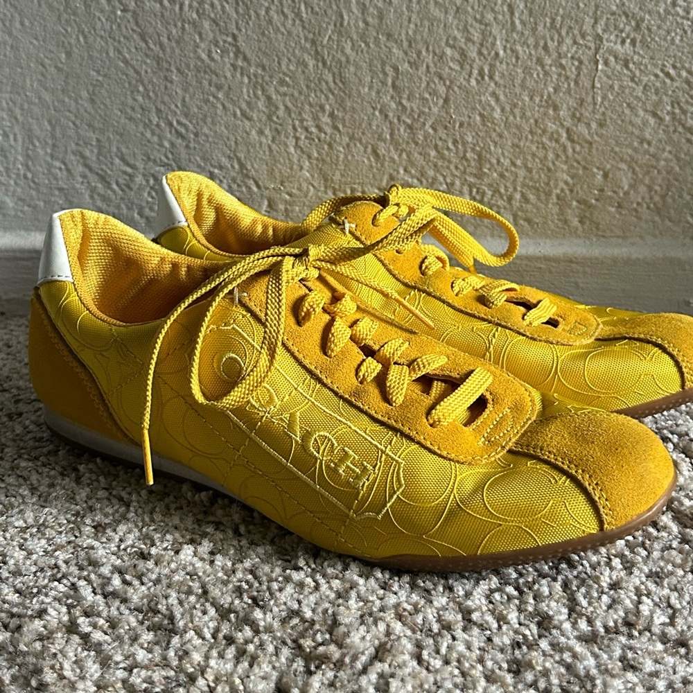 Vintage yellow Coach Pattie sneakers.